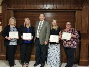 CPM Graduates with Mr. Lunsford. Left to right, Lisa Scruggs, Candice Lewis, Mr. Lunsford, Melissa Hogan, Marie Bumgarner